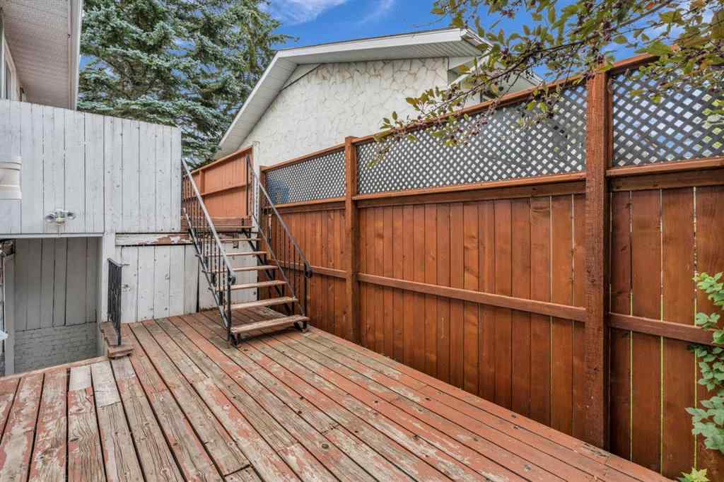 MLS® A2250254 - 403 Queen Alexandra Way SE in Queensland Calgary, Residential
