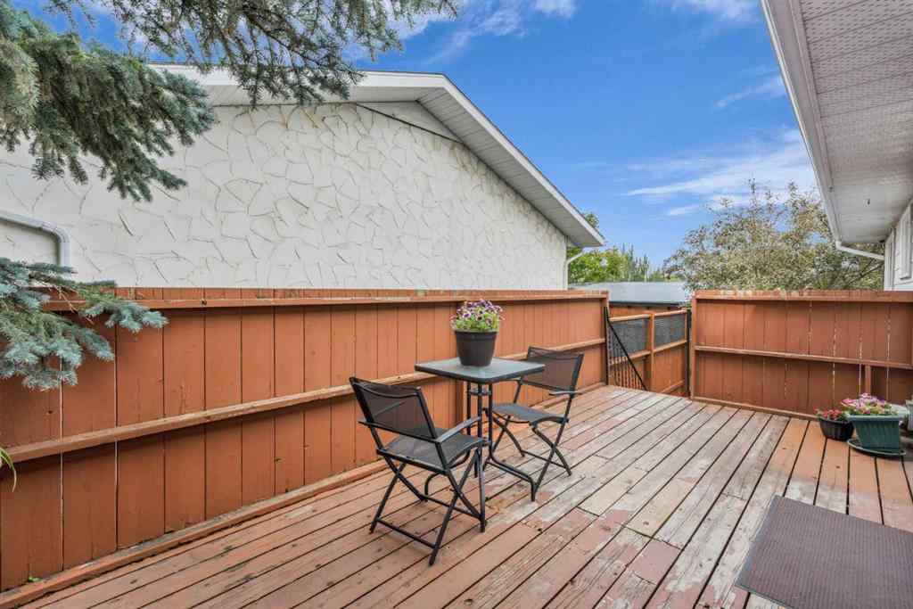 MLS® A2250254 - 403 Queen Alexandra Way SE in Queensland Calgary, Residential