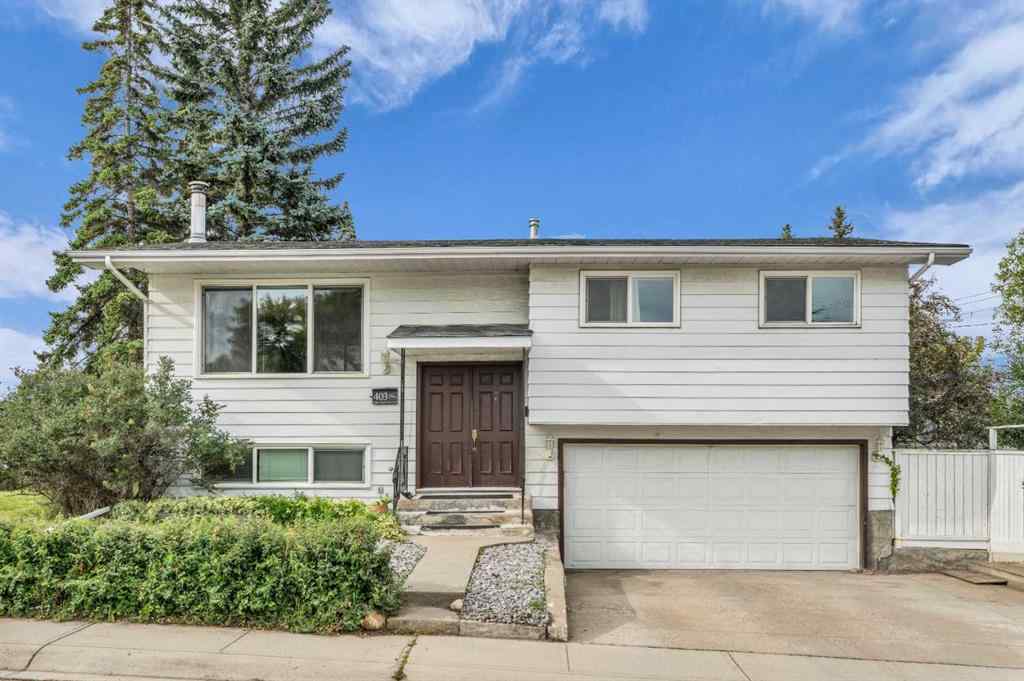 MLS® A2250254 - 403 Queen Alexandra Way SE in Queensland Calgary, Residential
