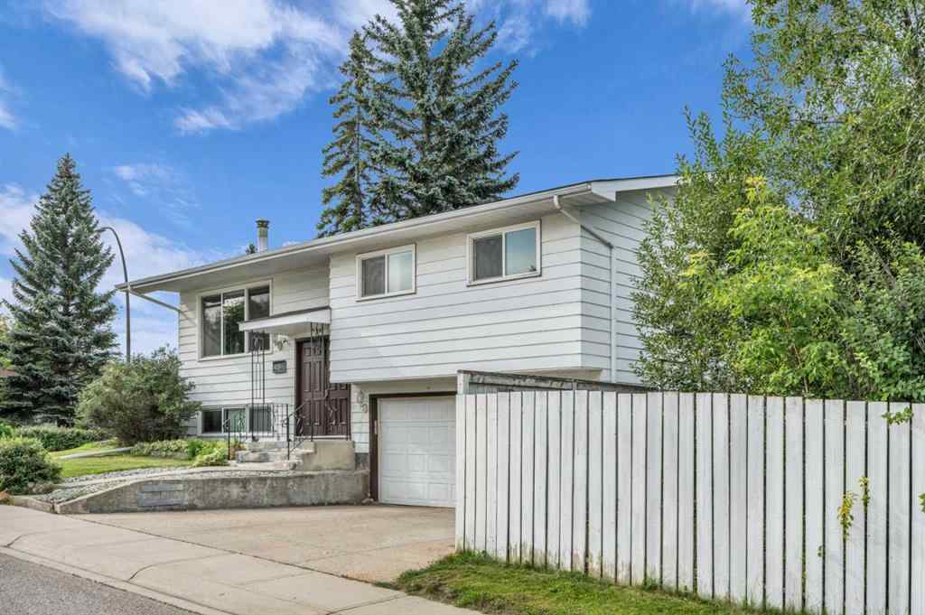 MLS® A2250254 - 403 Queen Alexandra Way SE in Queensland Calgary, Residential