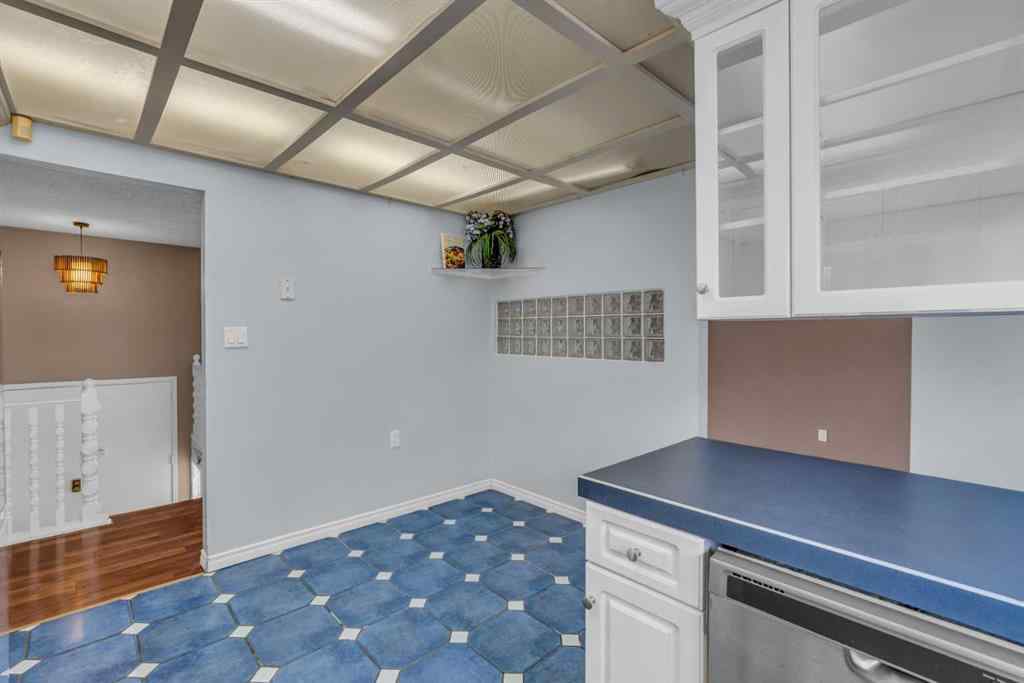 MLS® A2250254 - 403 Queen Alexandra Way SE in Queensland Calgary, Residential