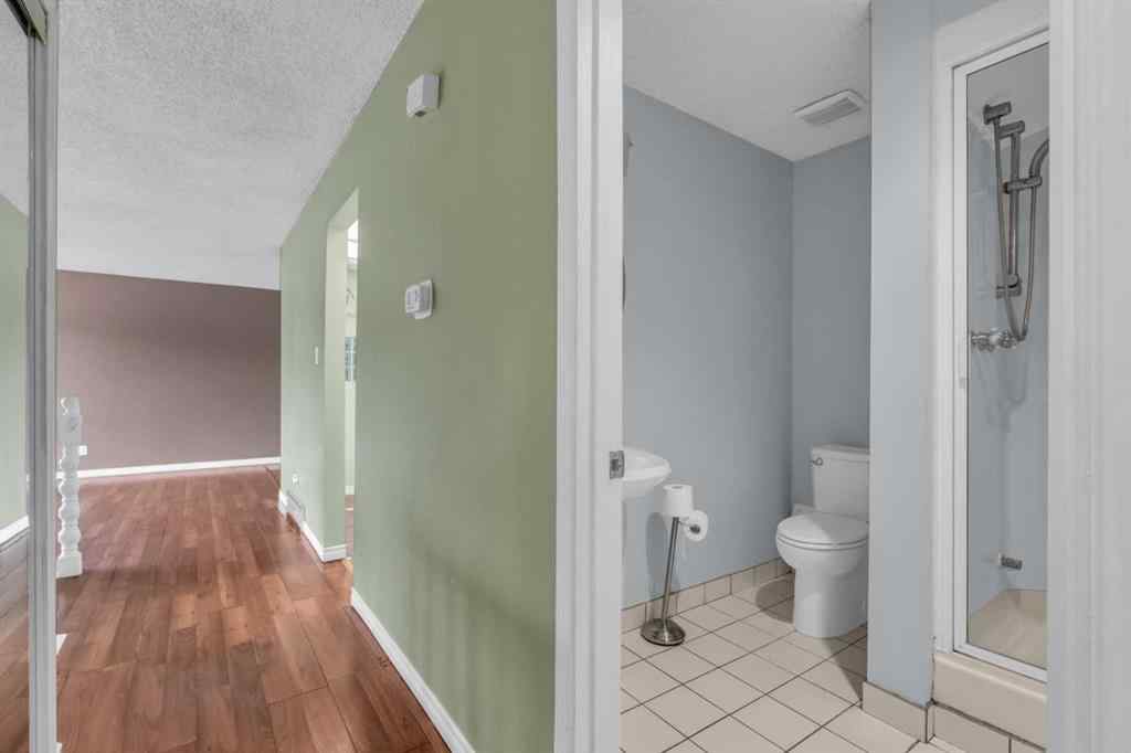 MLS® A2250254 - 403 Queen Alexandra Way SE in Queensland Calgary, Residential
