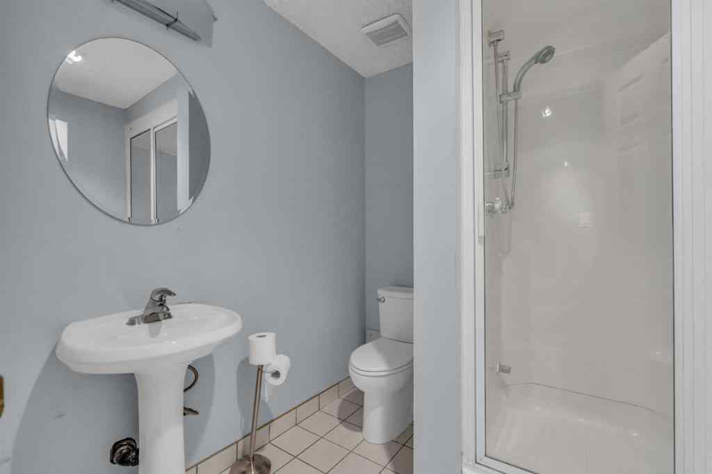 MLS® A2250254 - 403 Queen Alexandra Way SE in Queensland Calgary, Residential