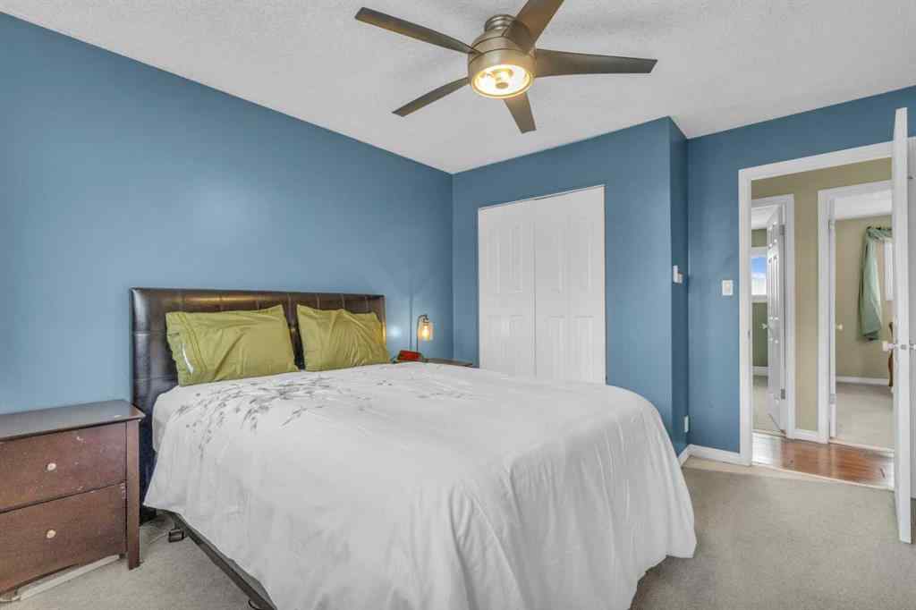 MLS® A2250254 - 403 Queen Alexandra Way SE in Queensland Calgary, Residential