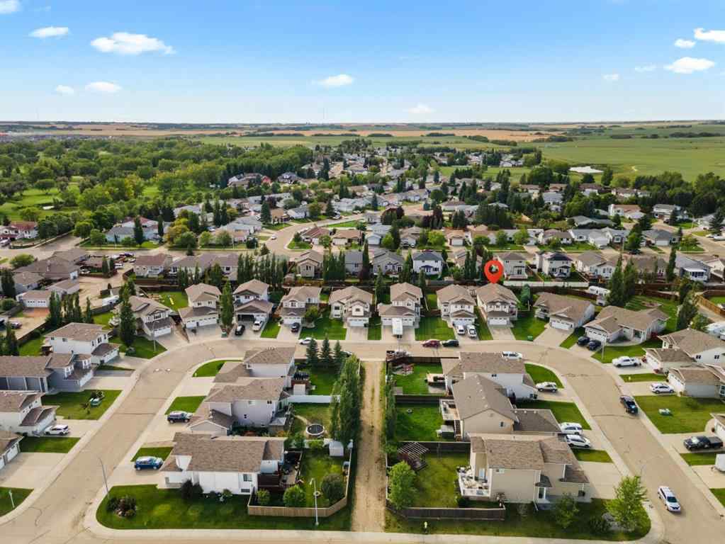 MLS® A2250257 - 5414 59 Street  in Creekside Camrose, Residential