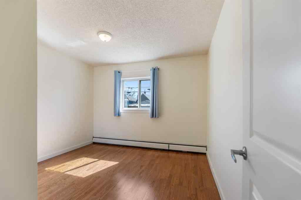 MLS® A2250262 - Unit #10 1717 Westmount Road NW in Hillhurst Calgary, Residential
