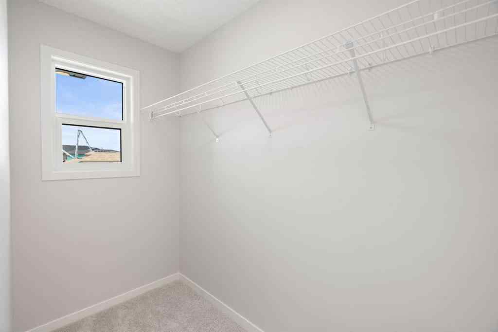 MLS® A2250270 - 262 West Grove Lane SW in West Springs Calgary, Residential
