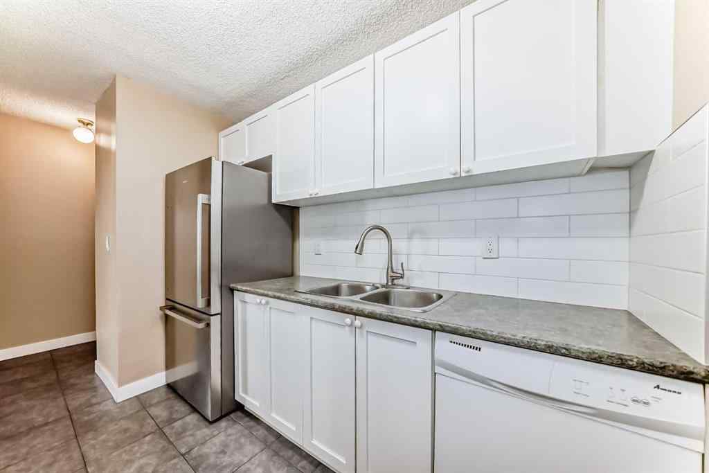 MLS® A2250271 - Unit #202 4944 Dalton Drive NW in Dalhousie Calgary, Residential