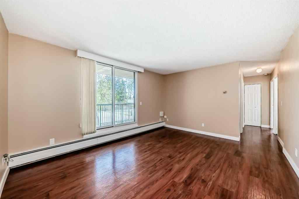 MLS® A2250271 - Unit #202 4944 Dalton Drive NW in Dalhousie Calgary, Residential