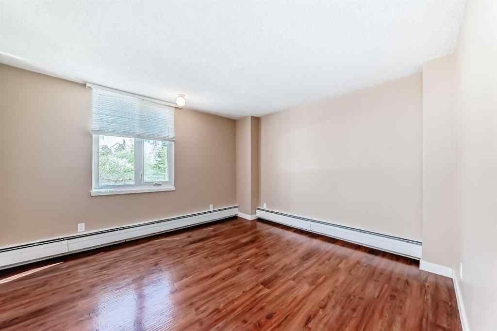 MLS® A2250271 - Unit #202 4944 Dalton Drive NW in Dalhousie Calgary, Residential
