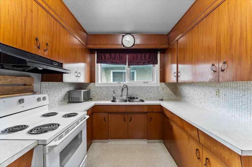 MLS® A2250286 - 7311 / 7313 79 Avenue  in King Edward Park Edmonton, Residential