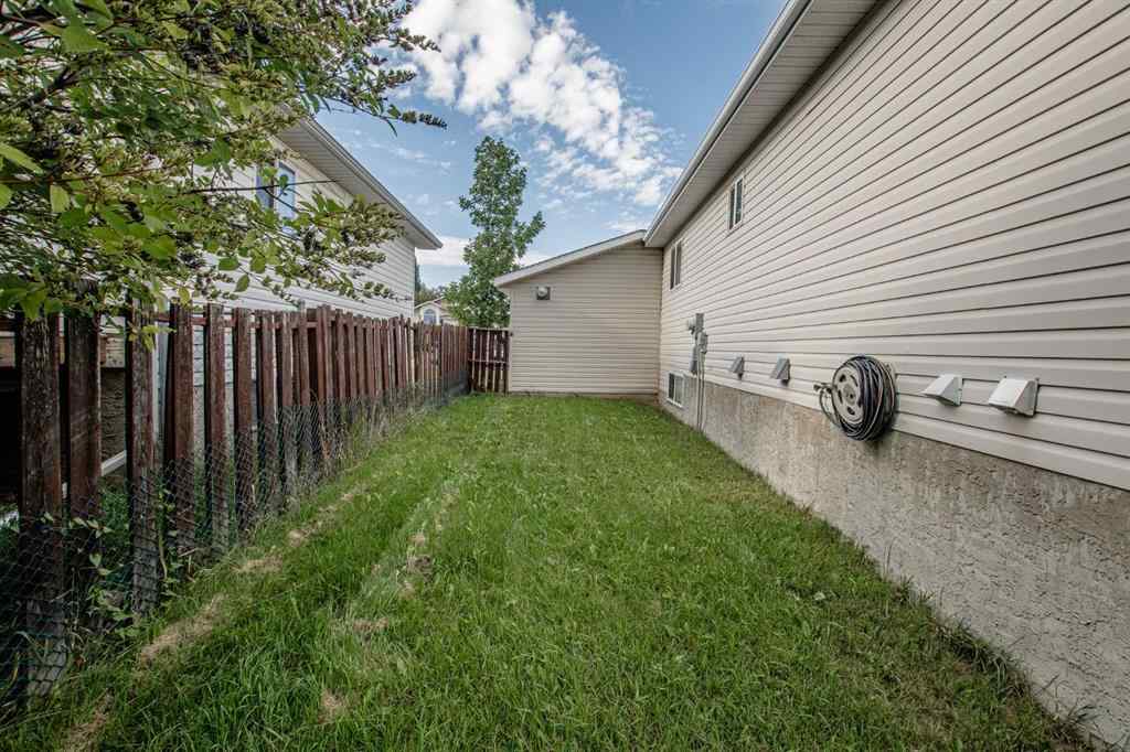 MLS® A2250297 - 8825 104 Avenue  in Ivy Lake Estates Grande Prairie, Residential