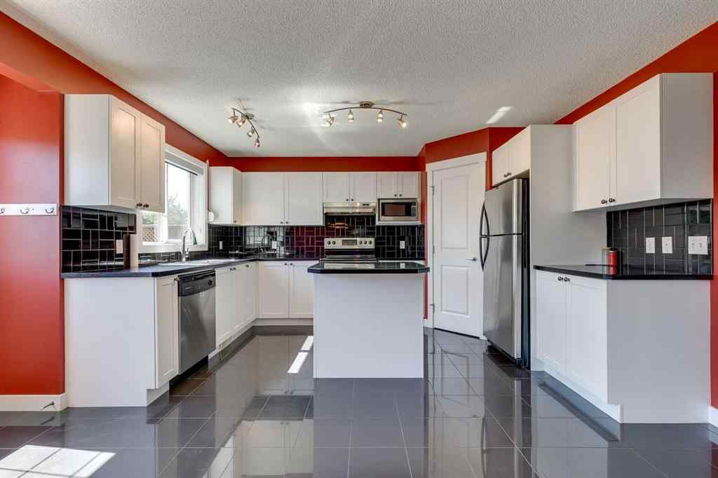 MLS® A2250307 - 508 Saddlecrest Boulevard NE in Saddle Ridge Calgary, Residential