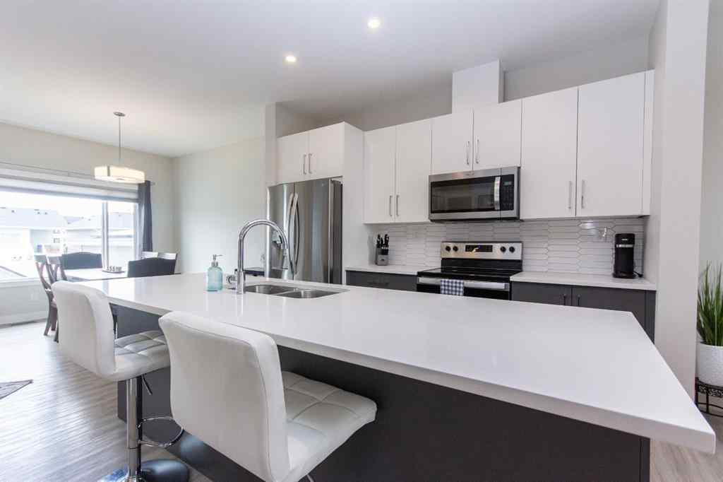 MLS® A2250316 - 77 Ellington Crescent  in Evergreen Red Deer, Residential