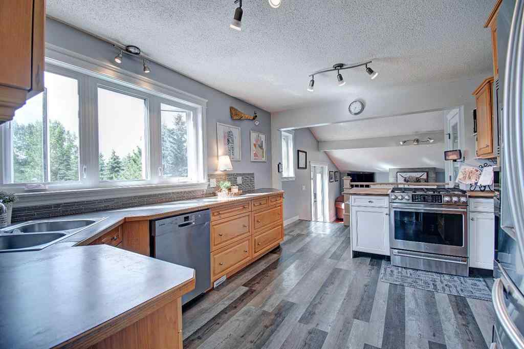 MLS® A2250332 - 104 Hill Spring Meadows  in Big Hill Springs Est Rural Rocky View County, Residential