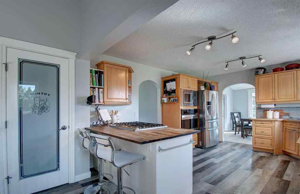 MLS® A2250332 - 104 Hill Spring Meadows  in Big Hill Springs Est Rural Rocky View County, Residential