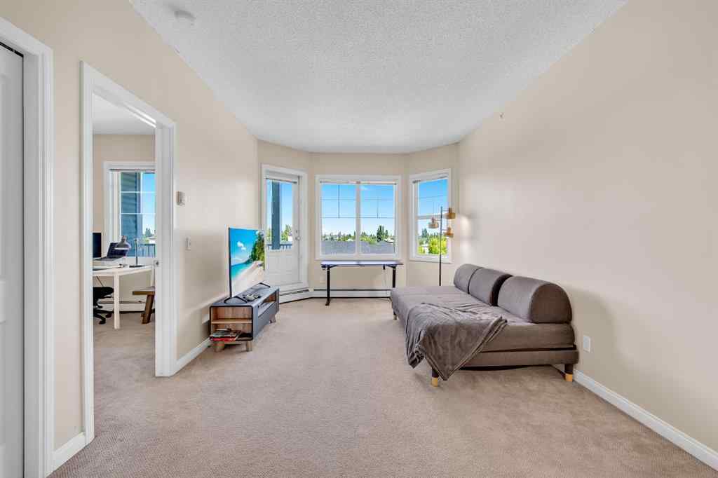 MLS® A2250337 - Unit #414 8 prestwick pond Terrace SE in McKenzie Towne Calgary, Residential