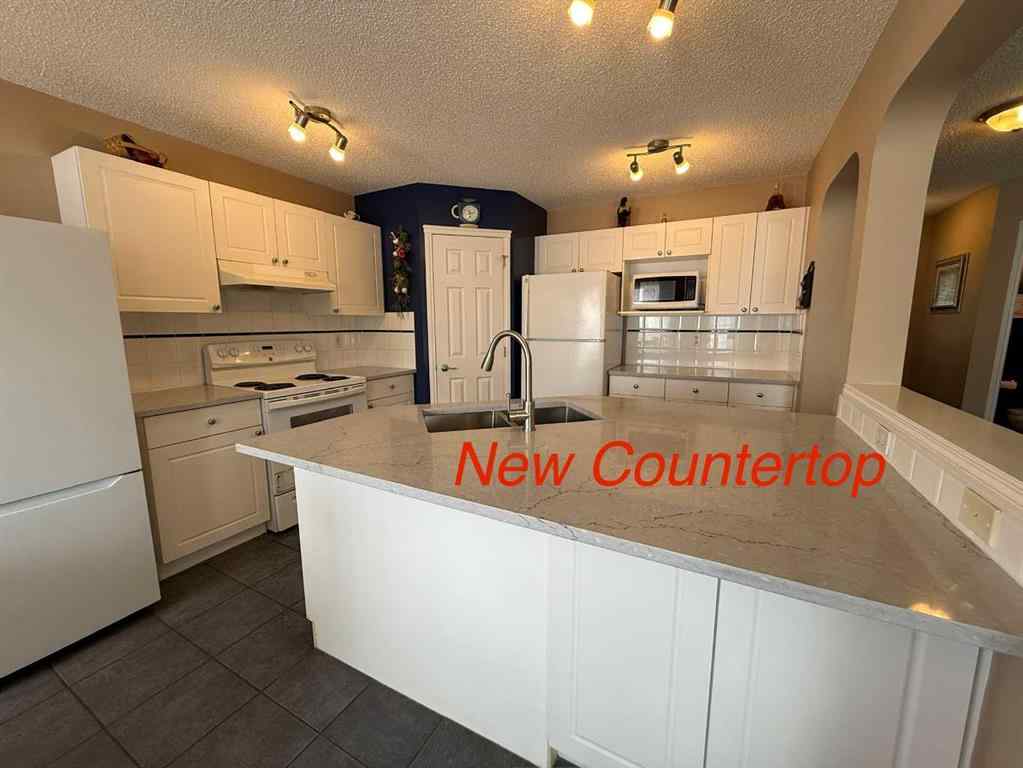 MLS® A2250347 - 15 Saddletree Drive NE in Saddle Ridge Calgary, Residential