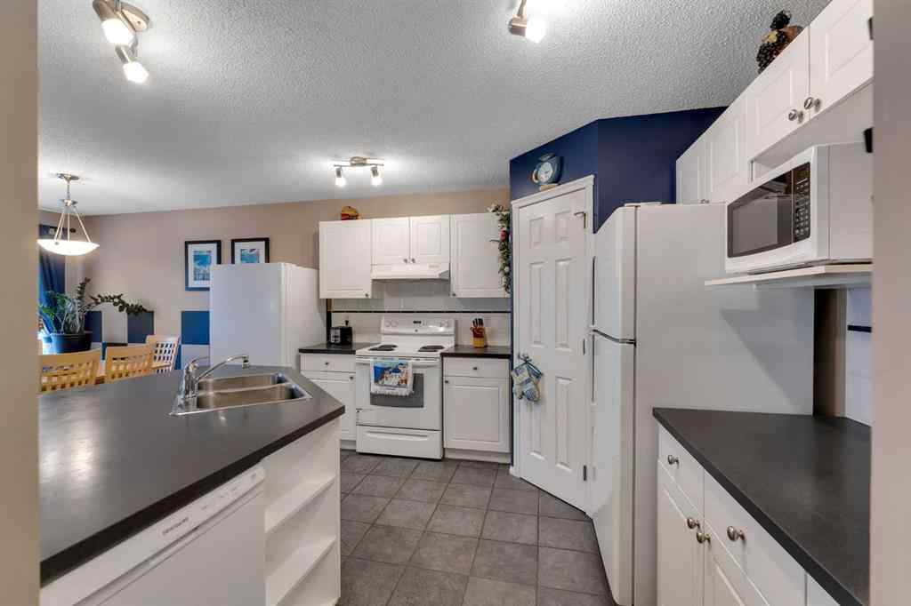 MLS® A2250347 - 15 Saddletree Drive NE in Saddle Ridge Calgary, Residential