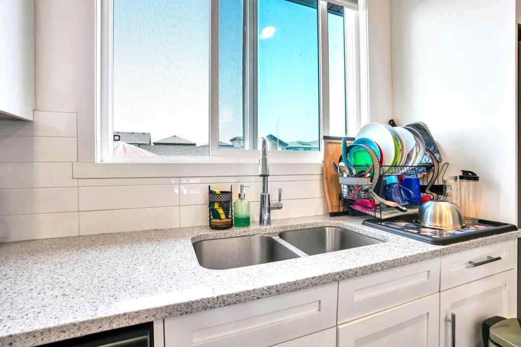 MLS® A2250358 - 426 Belmont Avenue SW in Belmont Calgary, Residential