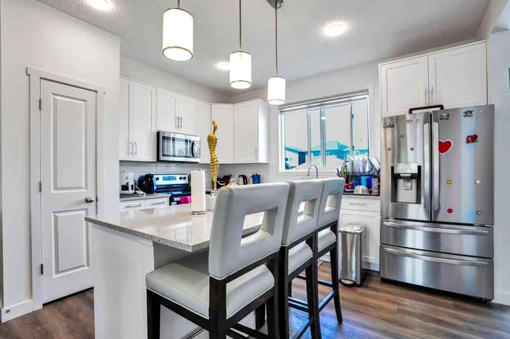 MLS® A2250358 - 426 Belmont Avenue SW in Belmont Calgary, Residential