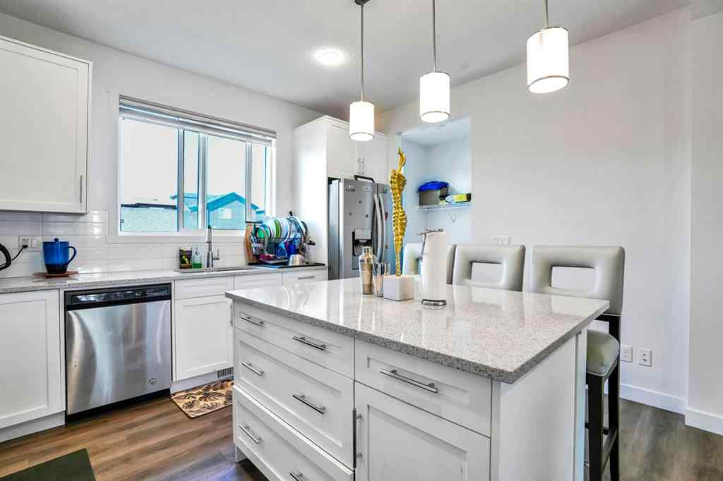 MLS® A2250358 - 426 Belmont Avenue SW in Belmont Calgary, Residential
