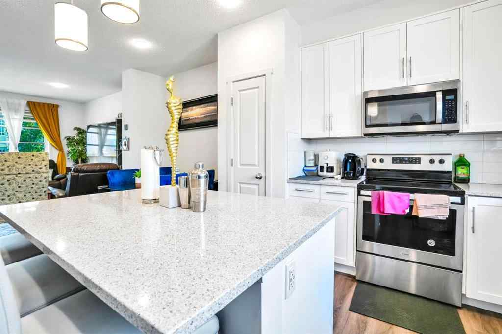 MLS® A2250358 - 426 Belmont Avenue SW in Belmont Calgary, Residential