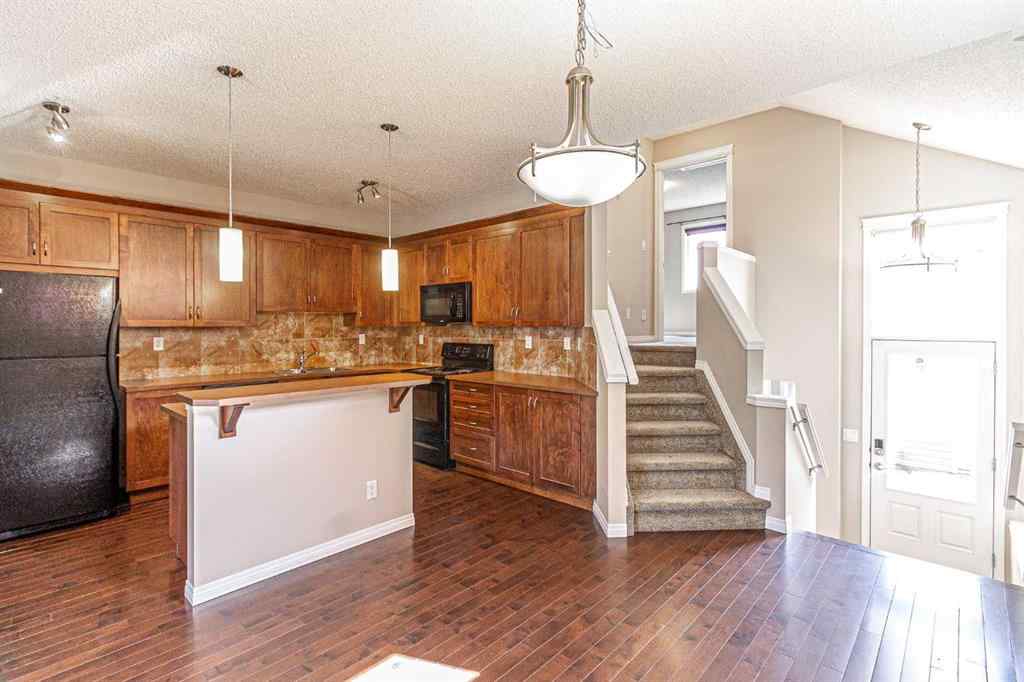MLS® A2250374 - 312 New Brighton Landing SE in New Brighton Calgary, Residential