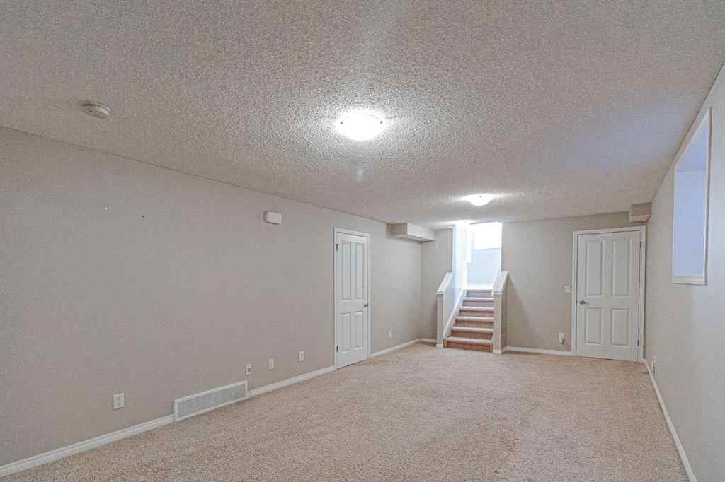 MLS® A2250374 - 312 New Brighton Landing SE in New Brighton Calgary, Residential