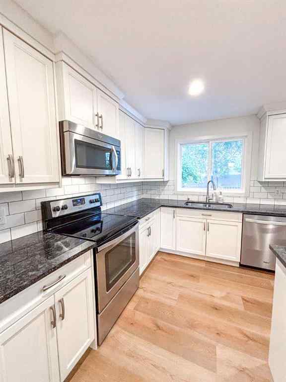 MLS® A2250378 - 12 Oakbury Place SW in Oakridge Calgary, Residential