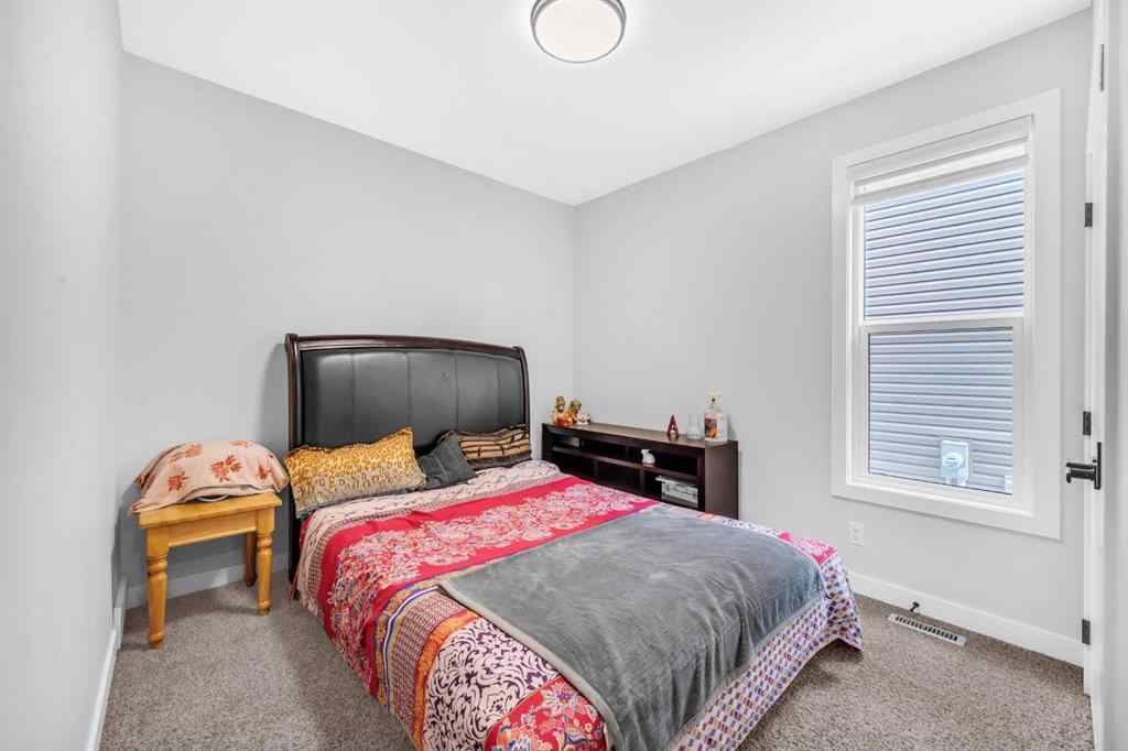MLS® A2250393 - 945 Midtown Avenue SW in Midtown Airdrie, Residential