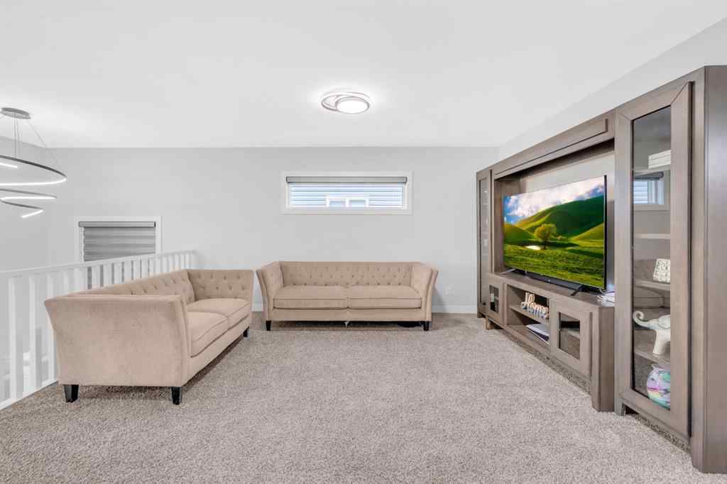 MLS® A2250393 - 945 Midtown Avenue SW in Midtown Airdrie, Residential