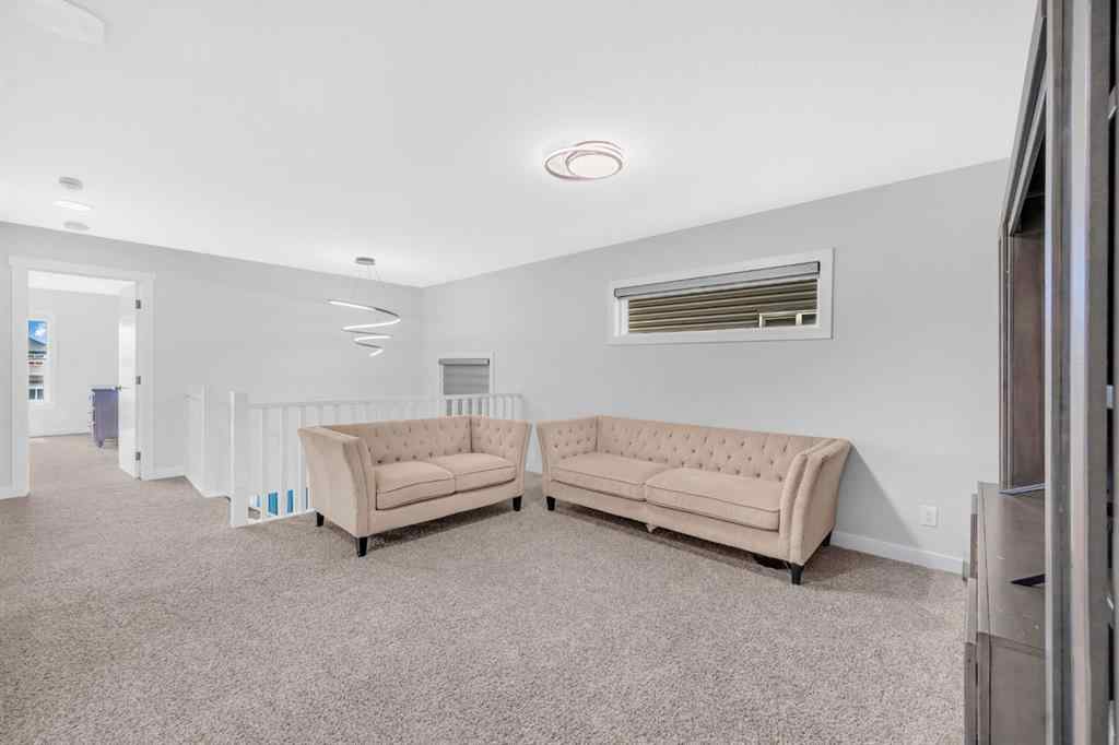MLS® A2250393 - 945 Midtown Avenue SW in Midtown Airdrie, Residential