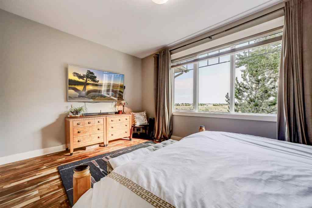 MLS® A2250397 - 411 Sandstone Lane S in Southridge Lethbridge, Residential