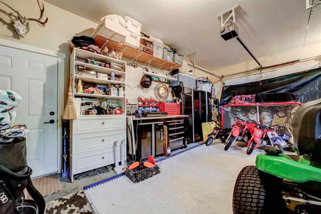 MLS® A2250397 - 411 Sandstone Lane S in Southridge Lethbridge, Residential