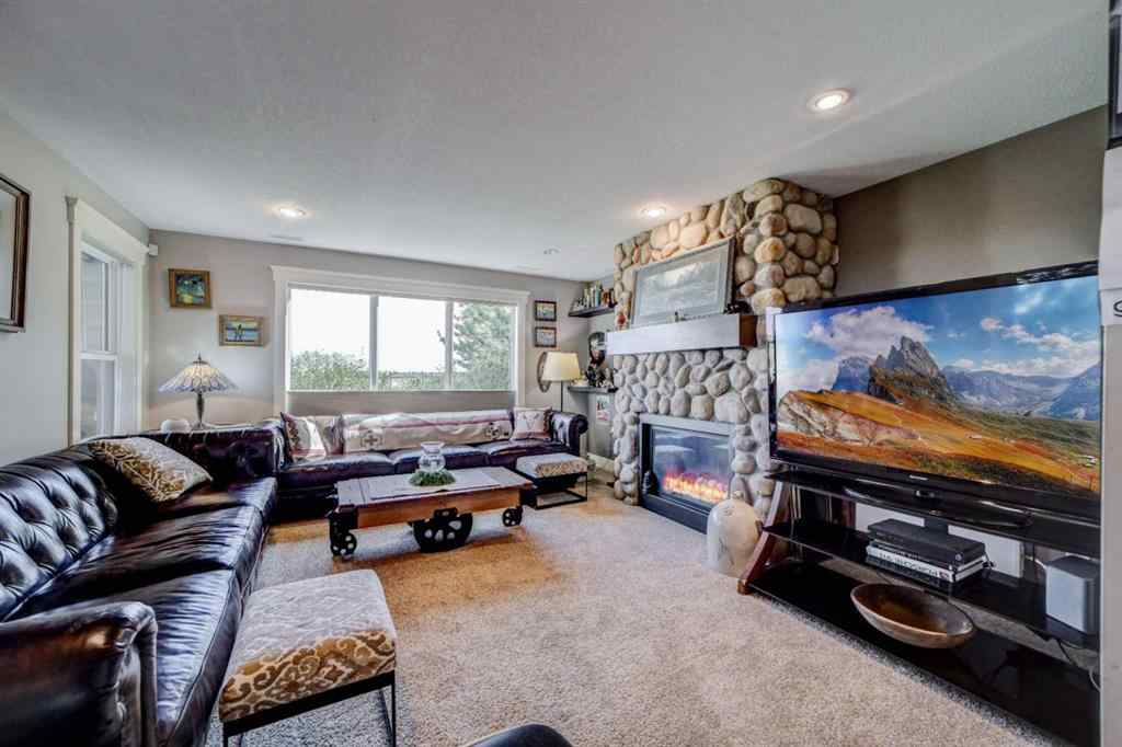 MLS® A2250397 - 411 Sandstone Lane S in Southridge Lethbridge, Residential