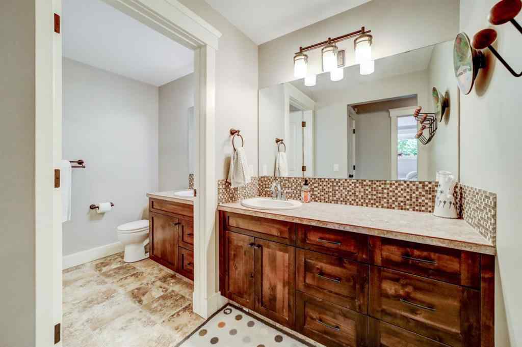 MLS® A2250397 - 411 Sandstone Lane S in Southridge Lethbridge, Residential
