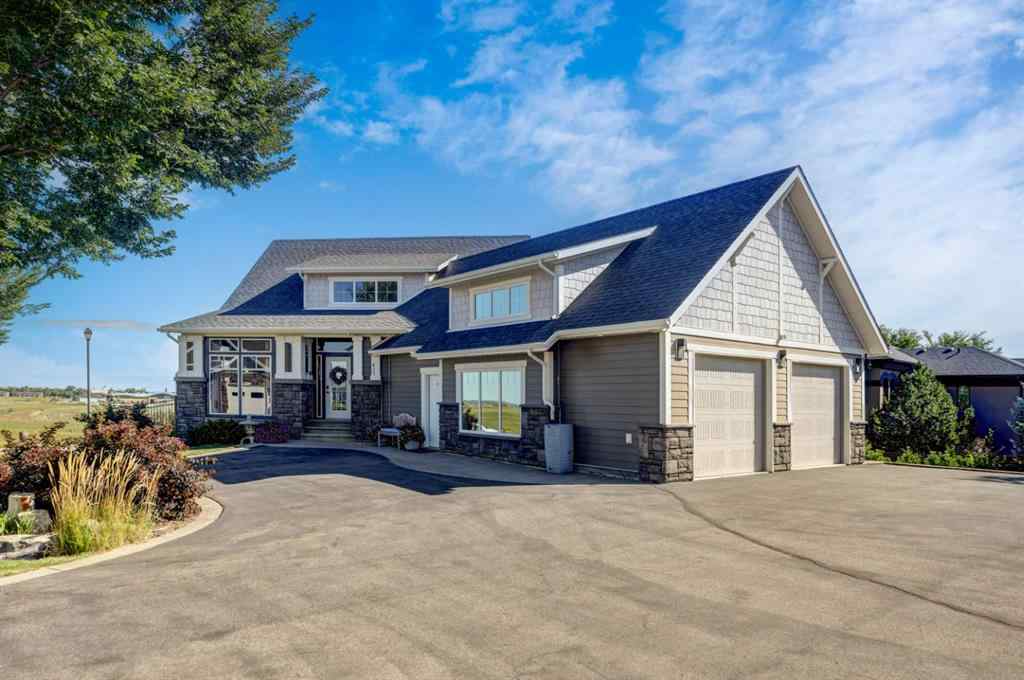 MLS® A2250397 - 411 Sandstone Lane S in Southridge Lethbridge, Residential
