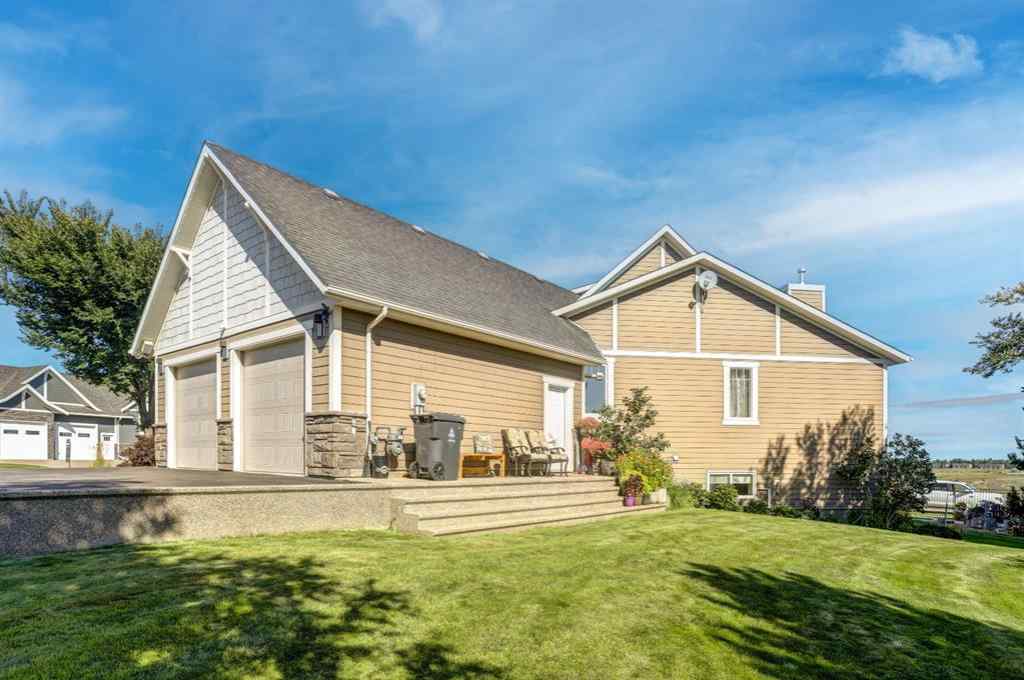 MLS® A2250397 - 411 Sandstone Lane S in Southridge Lethbridge, Residential