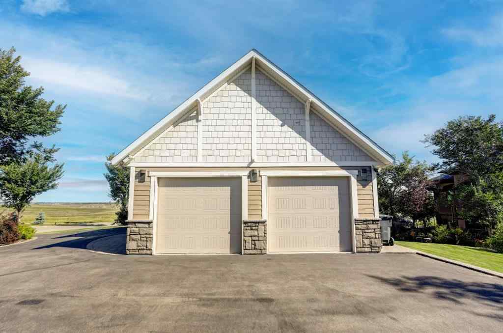MLS® A2250397 - 411 Sandstone Lane S in Southridge Lethbridge, Residential