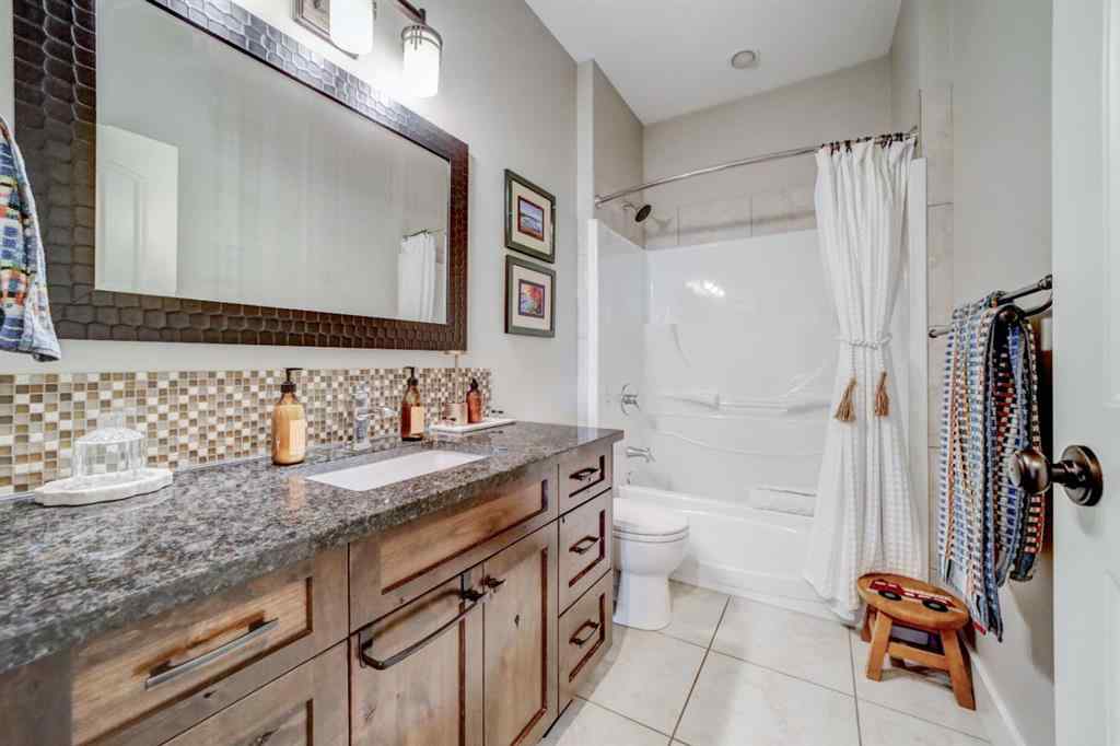 MLS® A2250397 - 411 Sandstone Lane S in Southridge Lethbridge, Residential