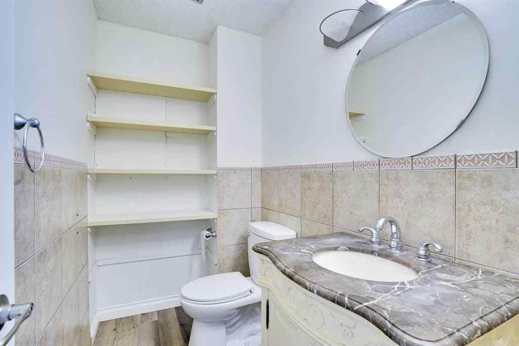 MLS® A2250426 - 76 Coach Manor Rise SW in Coach Hill Calgary, Residential
