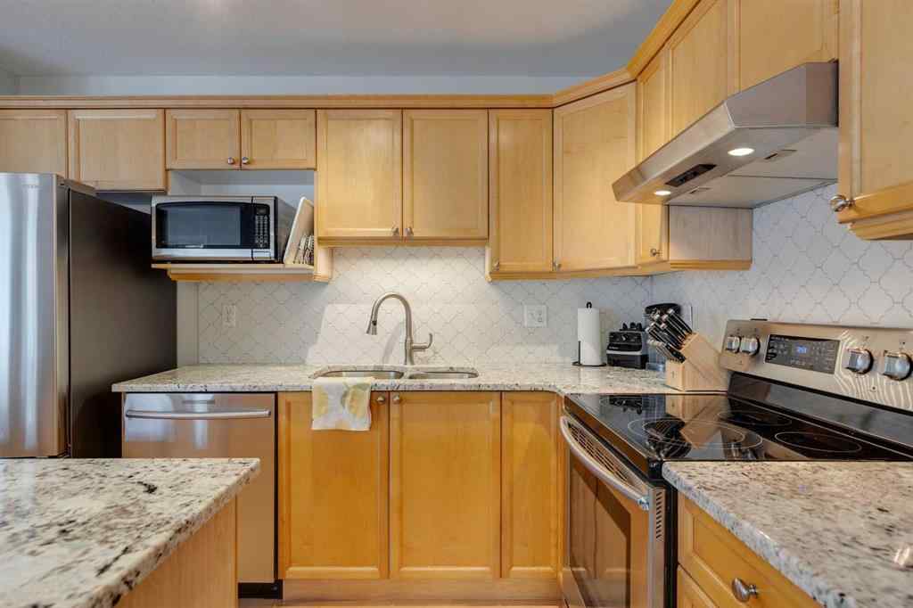 MLS® A2250429 - 46 Simcoe Place SW in Signal Hill Calgary, Residential