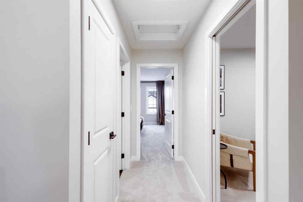 MLS® A2250438 - 104 Sundown Crescent  in Sunset Ridge Cochrane, Residential