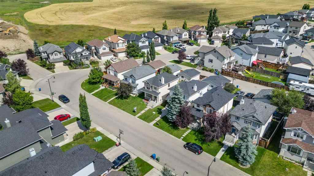 MLS® A2250453 - 169 Crystal Shores Grove  in Crystal Shores Okotoks, Residential
