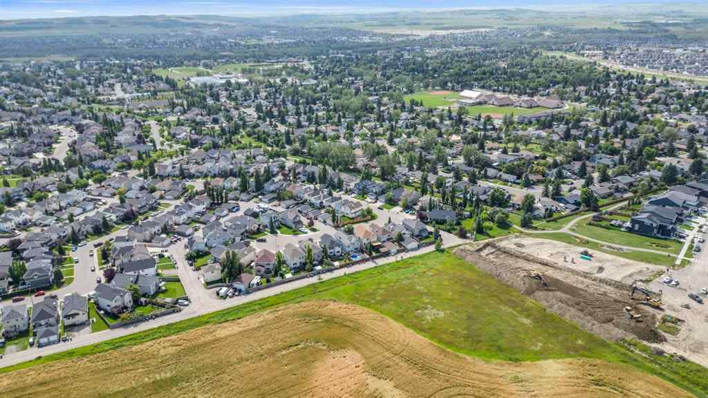 MLS® A2250453 - 169 Crystal Shores Grove  in Crystal Shores Okotoks, Residential