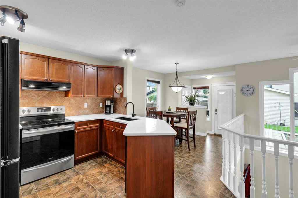 MLS® A2250453 - 169 Crystal Shores Grove  in Crystal Shores Okotoks, Residential