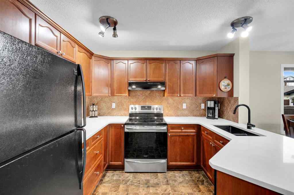 MLS® A2250453 - 169 Crystal Shores Grove  in Crystal Shores Okotoks, Residential