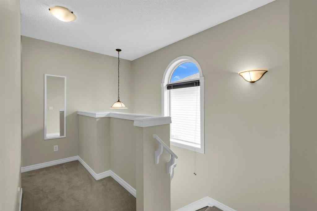 MLS® A2250453 - 169 Crystal Shores Grove  in Crystal Shores Okotoks, Residential