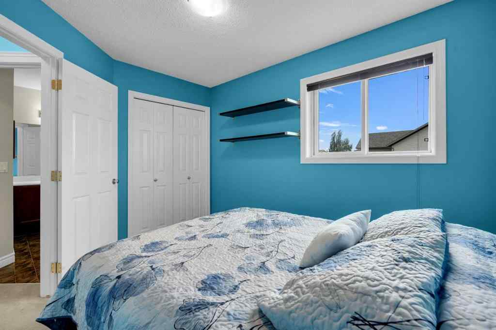 MLS® A2250453 - 169 Crystal Shores Grove  in Crystal Shores Okotoks, Residential